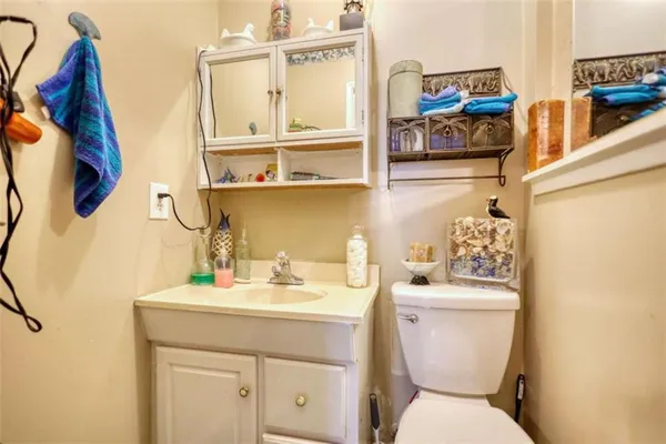 a living room with furniture and a rug