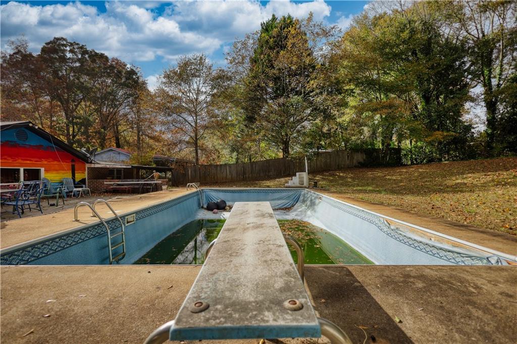 279 Spring Street Winder, GA 30680 - Photo 42 of 43 a view of swimming pool with chairs