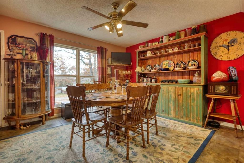 279 Spring Street Winder, GA 30680 - Photo 8 of 43 a view of a dining room with furniture window and outside view