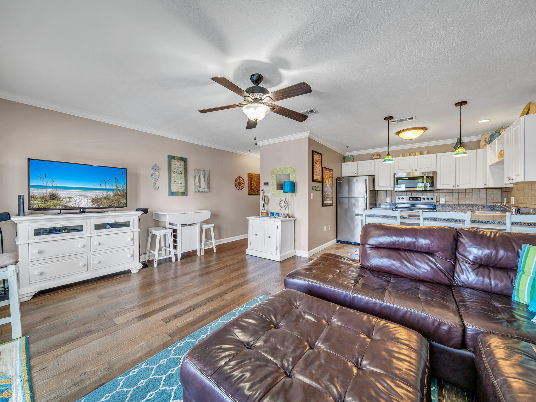 144 Spires Lane, Unit 209 Santa Rosa Beach, FL 32459 - Photo 12 of 27 a living room with furniture and a flat screen tv