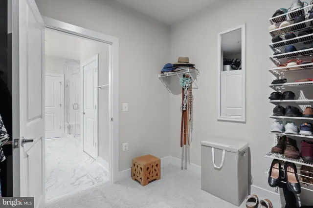 a view of empty room with closet