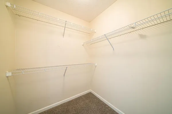 a view of a room with racks on the wall