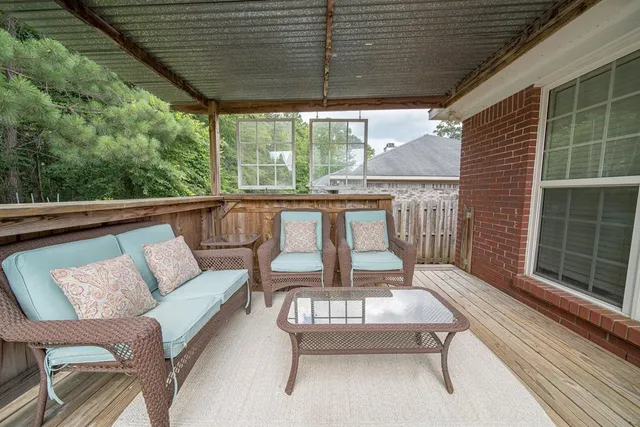 a balcony with furniture