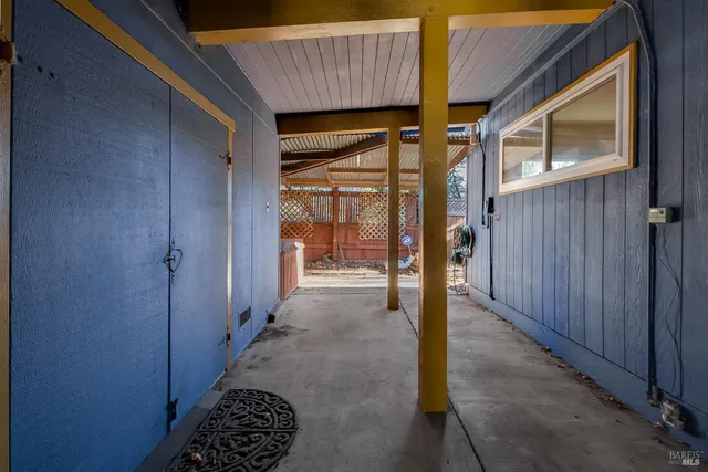 an aerial view of residential building and lake