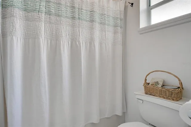 a front view of a house with garden space