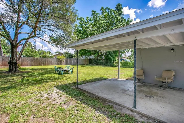 a view of a backyard with a garden