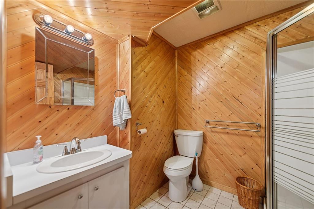 1508 Cemetery Street Monessen, PA 15062 - Photo 23 of 41 a bathroom with a granite countertop sink toilet and shower