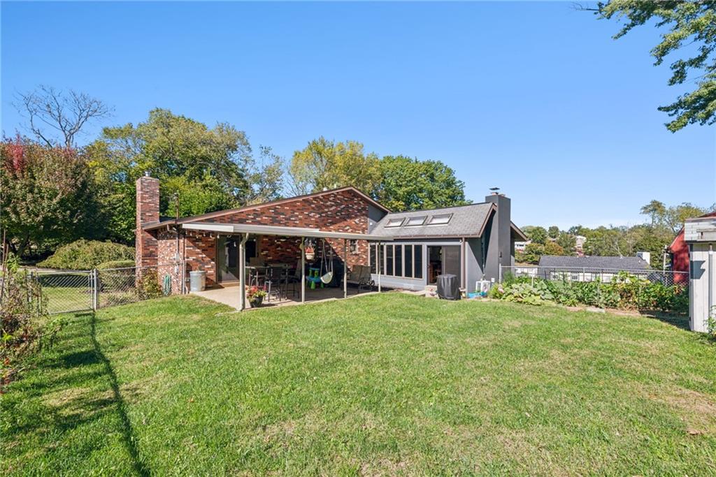 1508 Cemetery Street Monessen, PA 15062 - Photo 28 of 41 a view of a house with a yard and sitting area