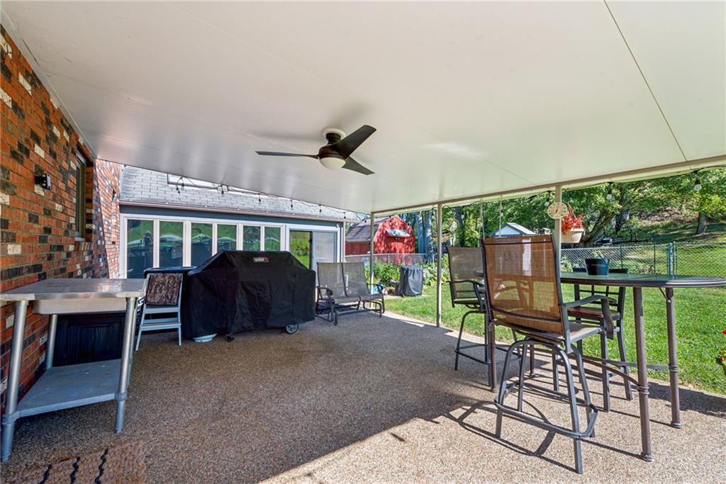 1508 Cemetery Street Monessen, PA 15062 - Photo 29 of 41 a view of a patio with a table and chairs