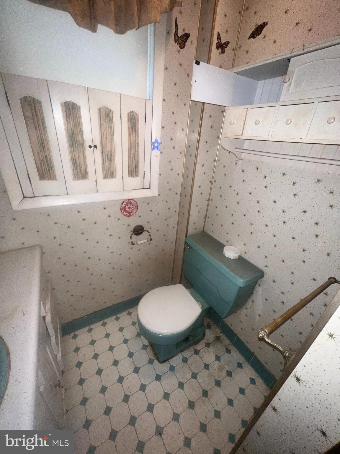 15515 Mt Savage Road Northwest Mount Savage, MD 21545 - Photo 15 of 39 a bathroom with a toilet and a shower