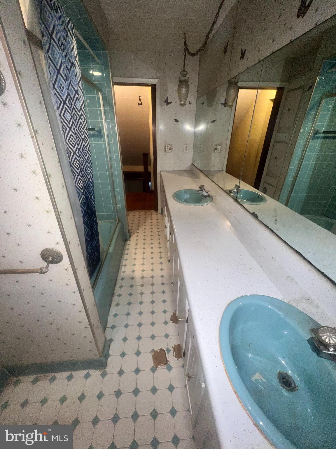 15515 Mt Savage Road Northwest Mount Savage, MD 21545 - Photo 16 of 39 a bathroom with a sink and mirror