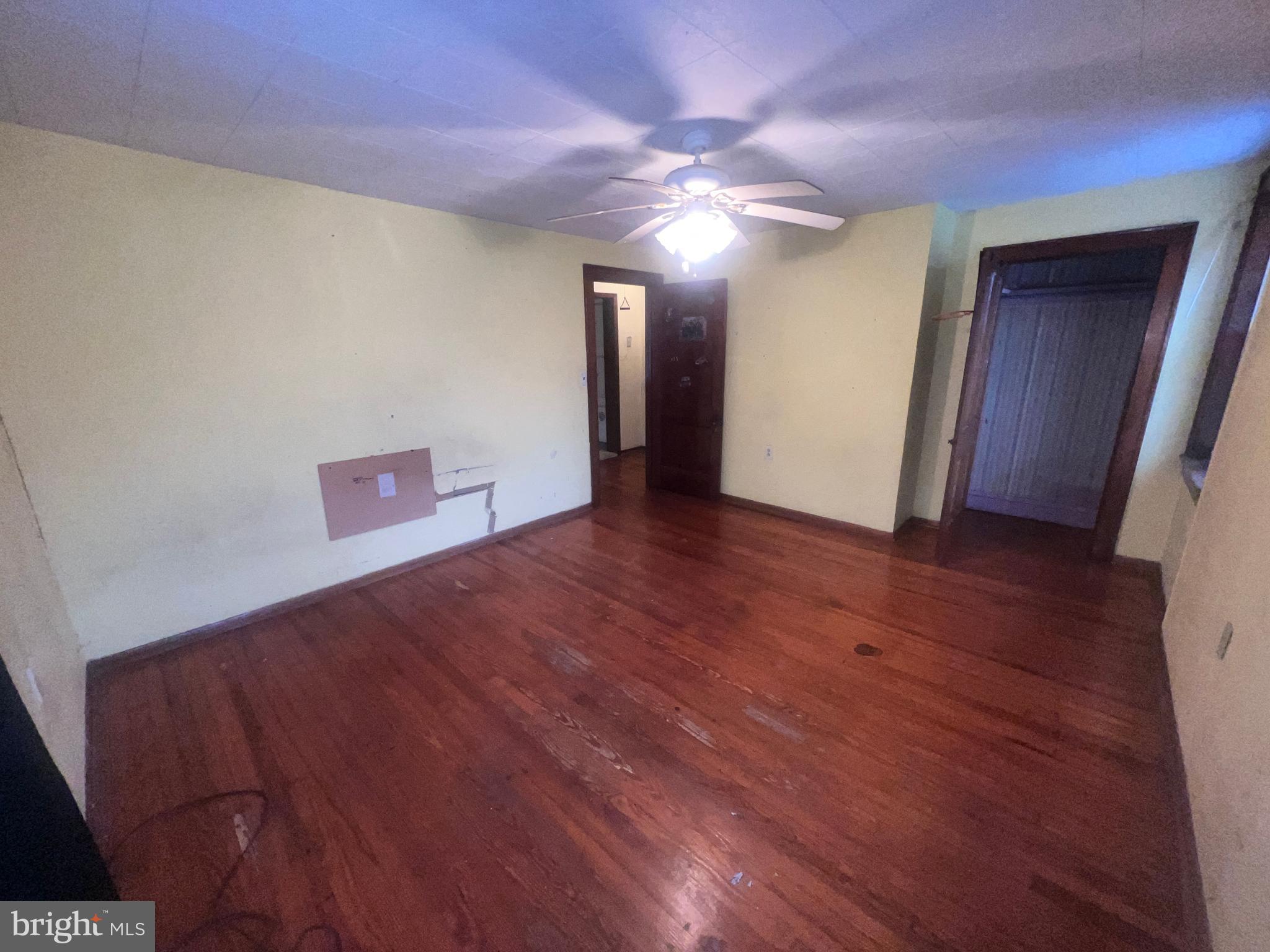 15515 Mt Savage Road Northwest Mount Savage, MD 21545 - Photo 21 of 39 a view of an empty room with wooden floor