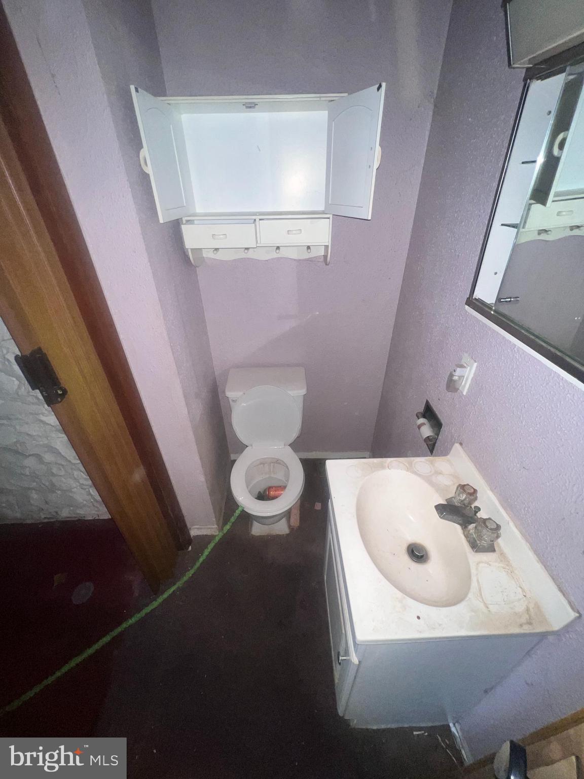 15515 Mt Savage Road Northwest Mount Savage, MD 21545 - Photo 6 of 39 a bathroom with a sink and toilet