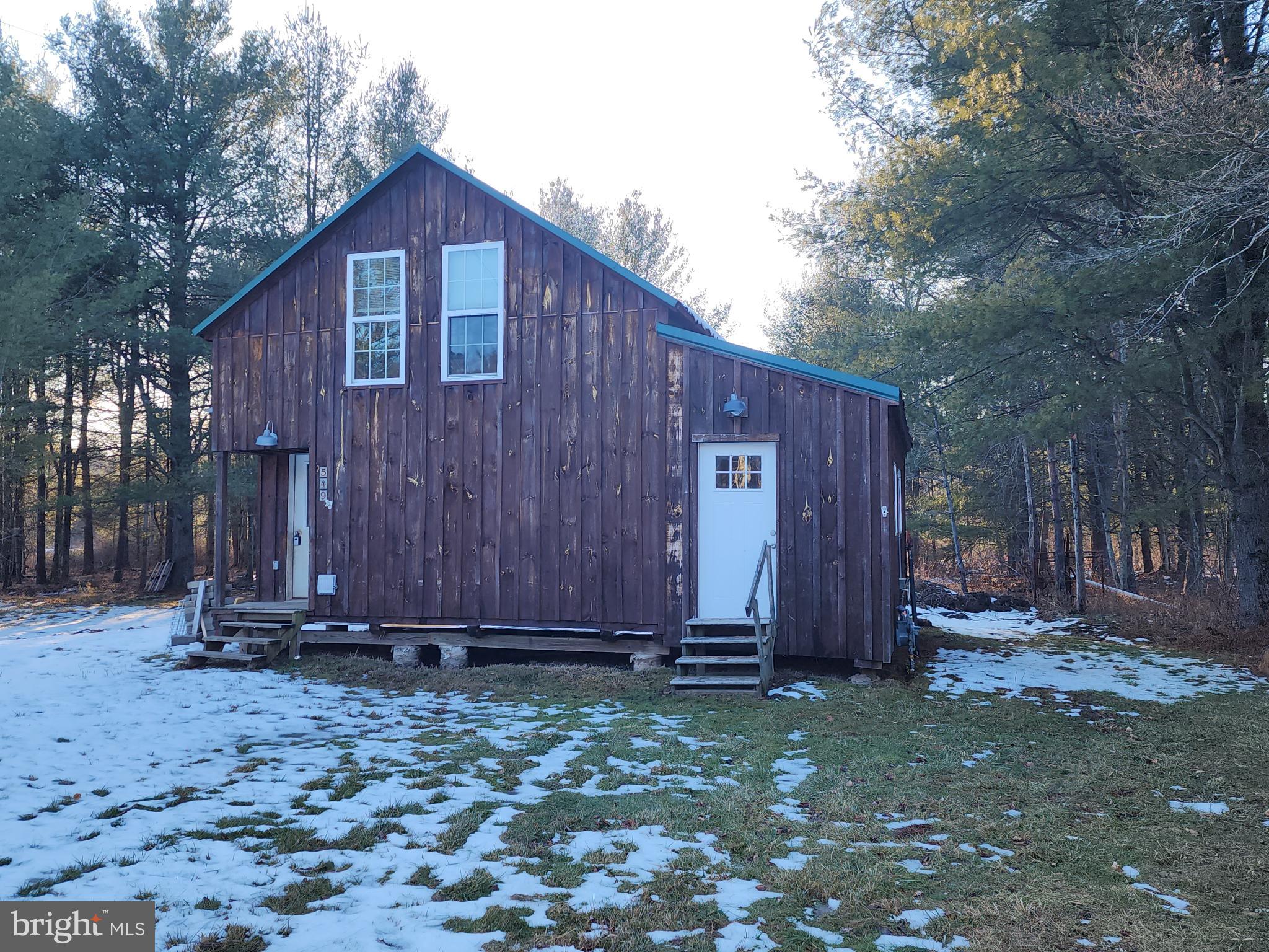 549 Blake Road Blossburg, PA 16912 - Photo 1 of 21 a view of barn with wooden fence
