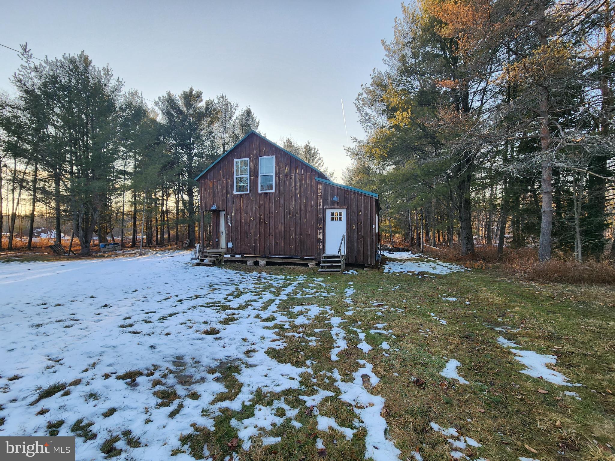 549 Blake Road Blossburg, PA 16912 - Photo 16 of 26 a view of a backyard with large trees