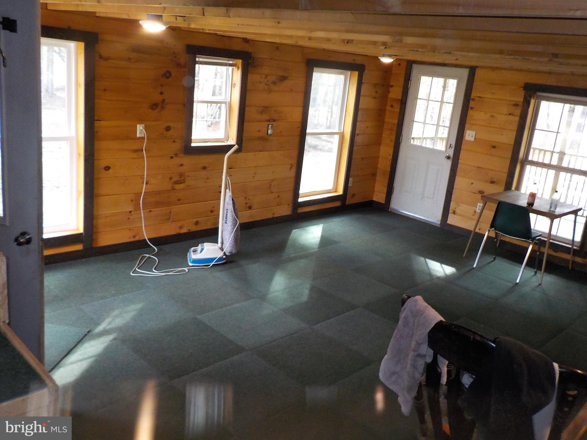 549 Blake Road Blossburg, PA 16912 - Photo 2 of 26 a view of a livingroom with furniture and window