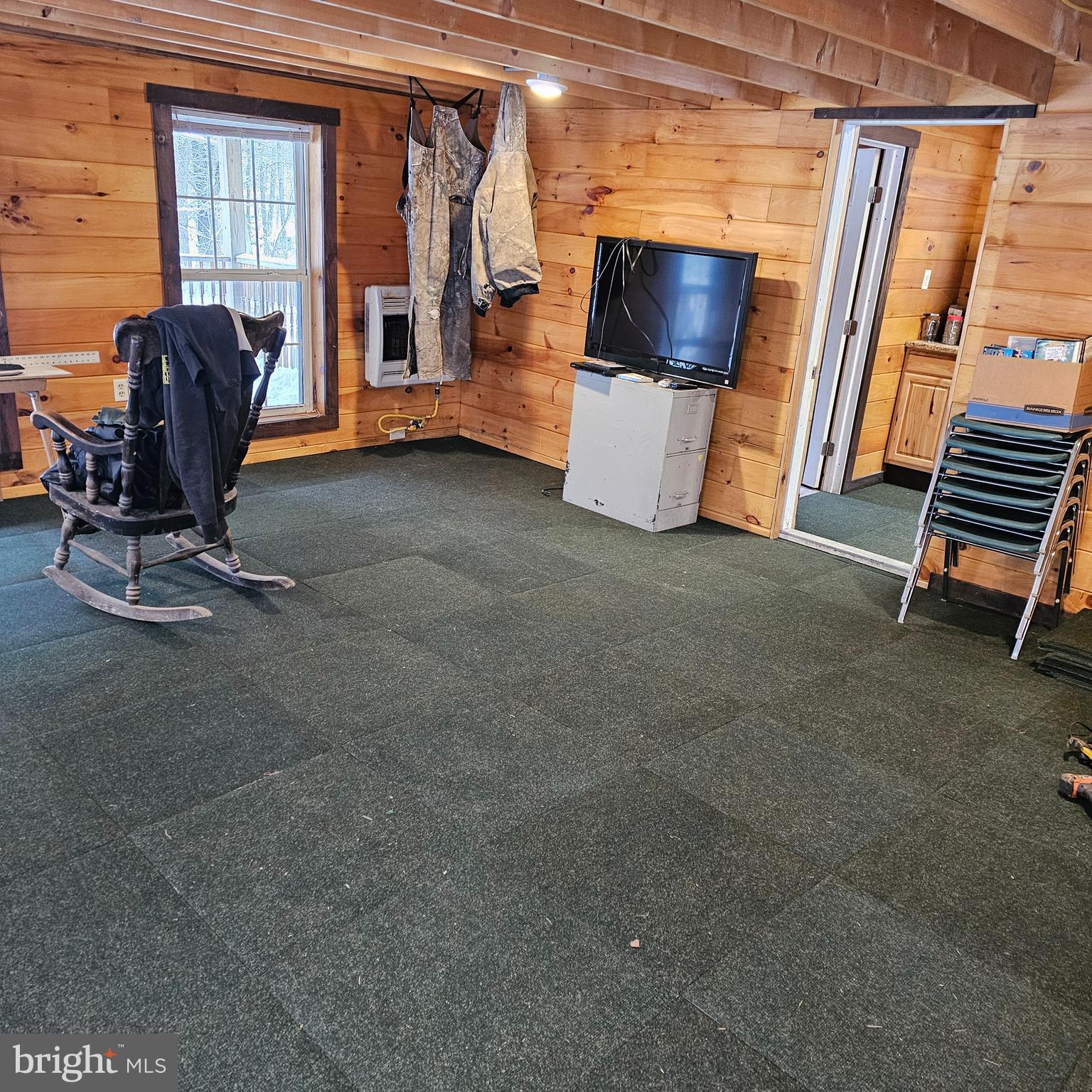 549 Blake Road Blossburg, PA 16912 - Photo 4 of 21 a living room with furniture and a flat screen tv