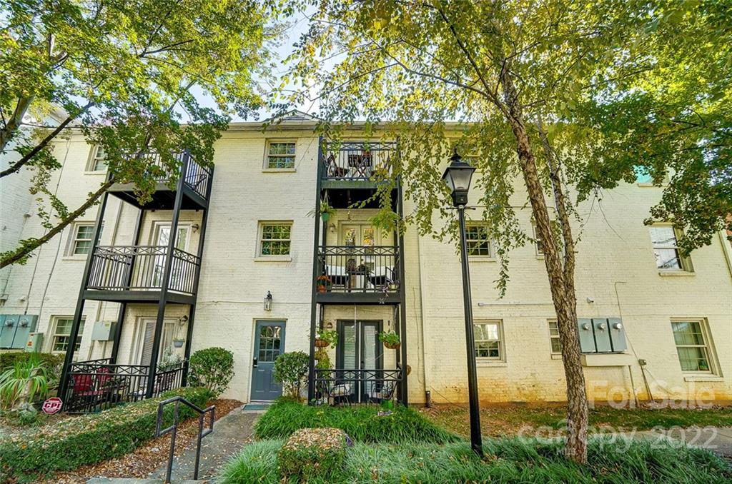 4919 Park Road, Unit C Charlotte, NC 28209 - Photo 2 of 41 front view of a house with a tree