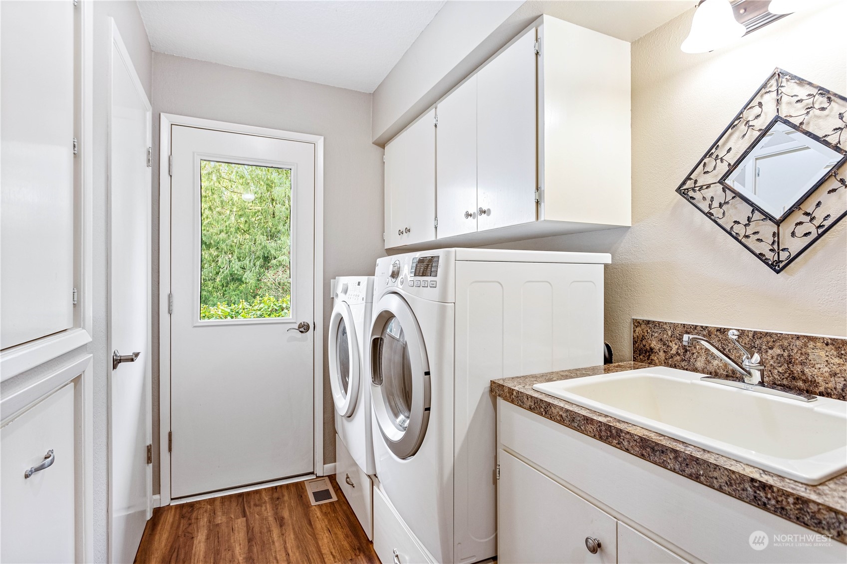 8669 Berthusen Road Lynden, WA 98264 - Photo 17 of 39 a utility room with dryer and washer