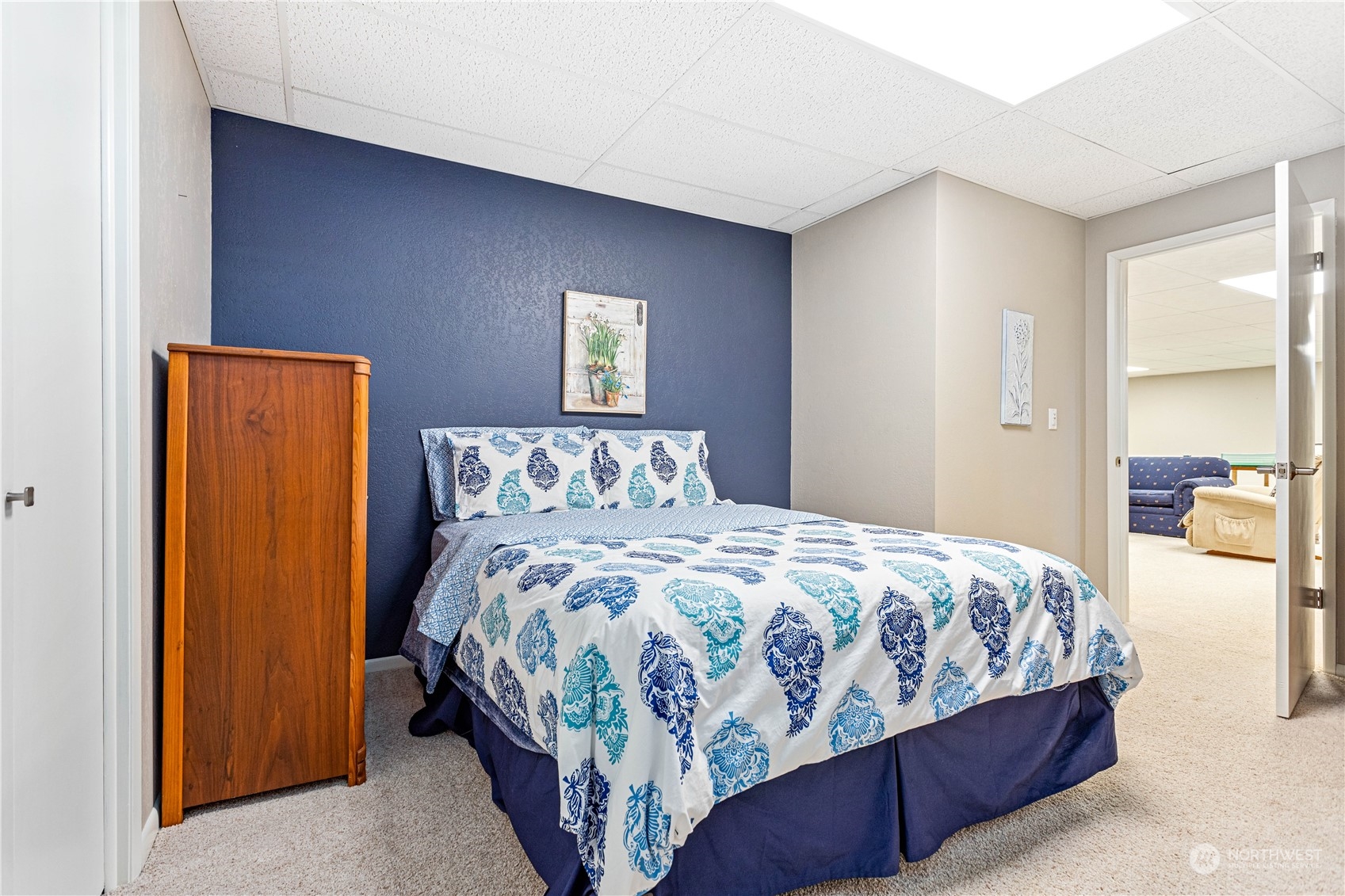 8669 Berthusen Road Lynden, WA 98264 - Photo 23 of 39 a bedroom with a bed and a window