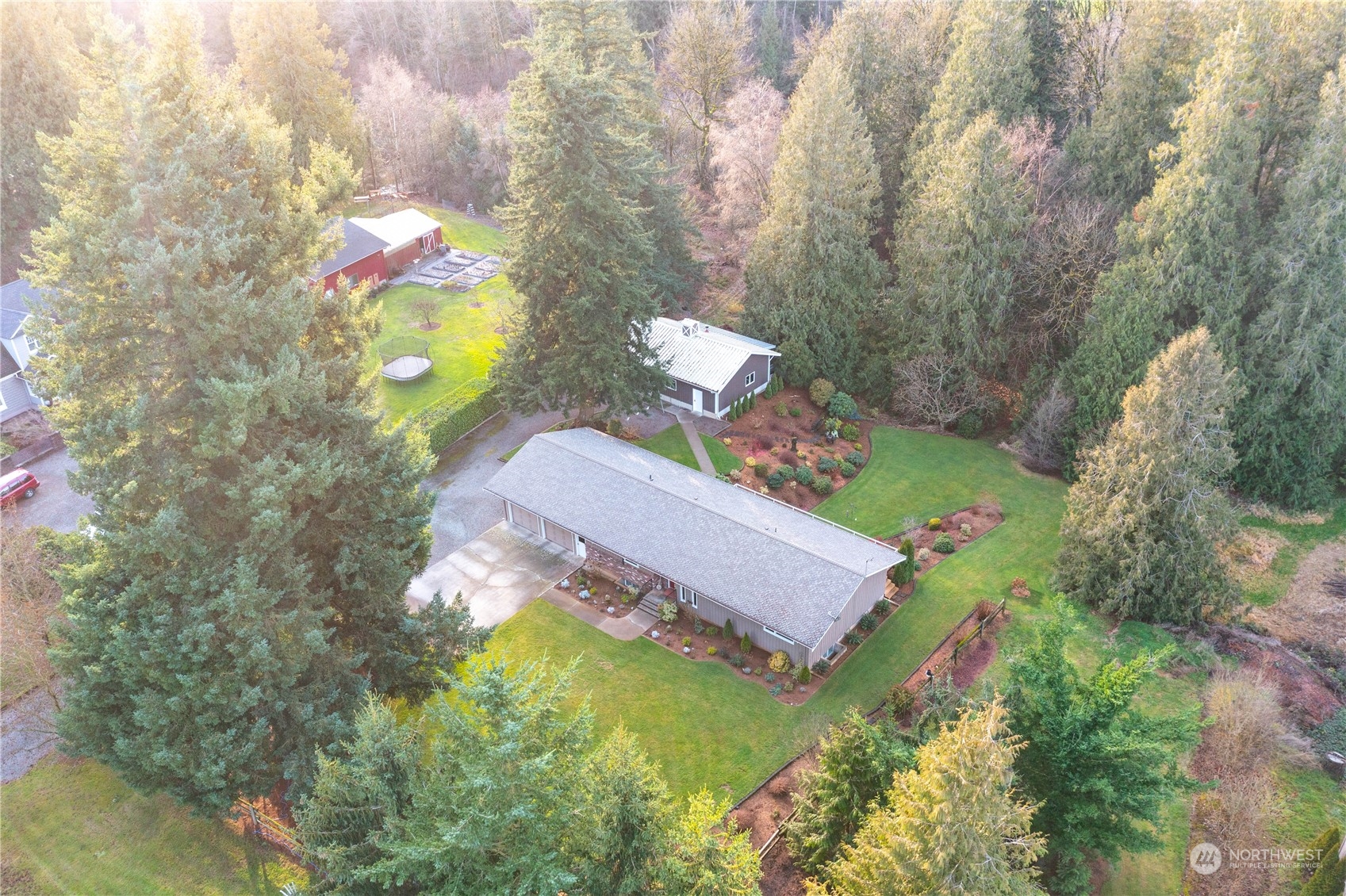 8669 Berthusen Road Lynden, WA 98264 - Photo 37 of 39 an aerial view of a house with a swimming pool