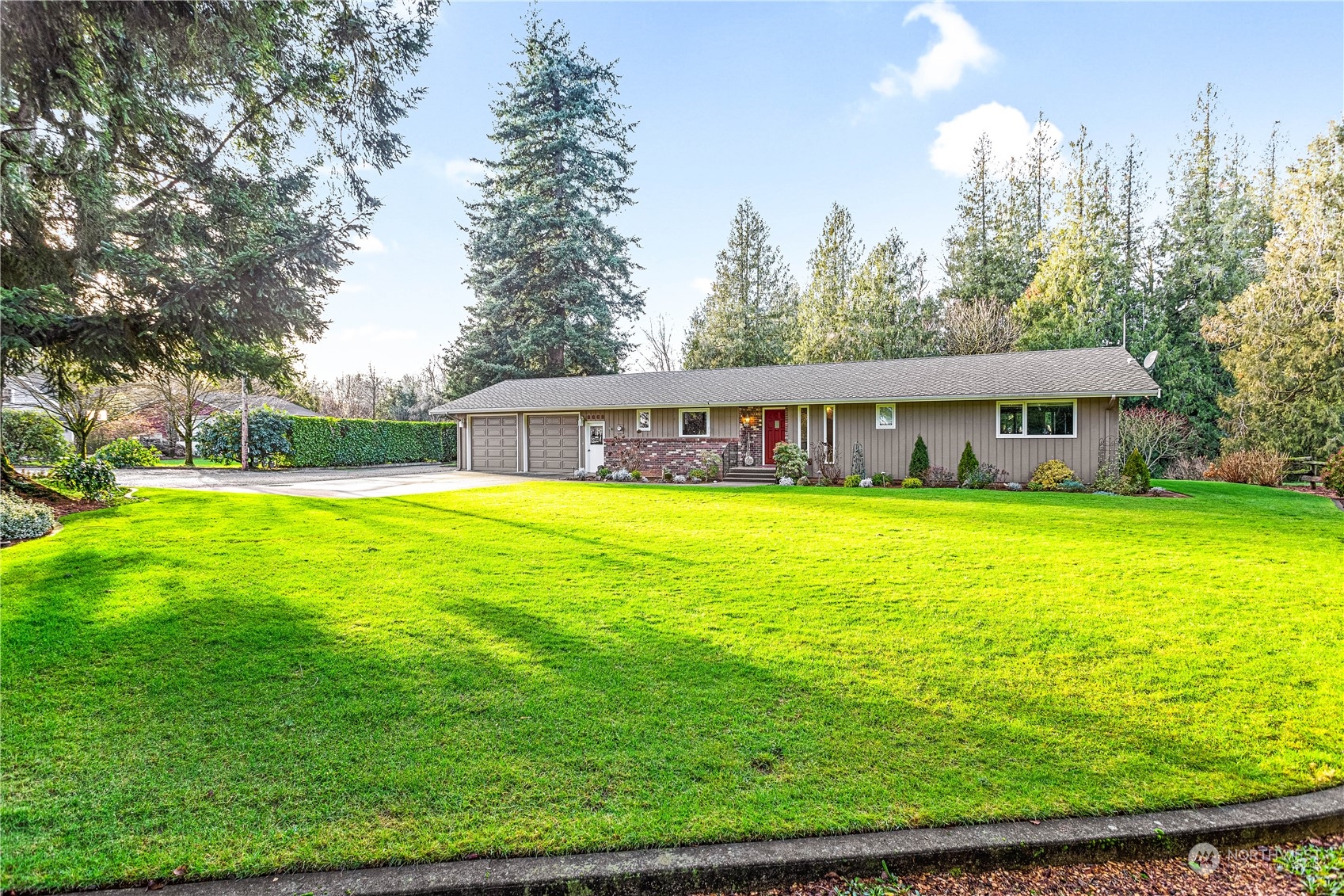 8669 Berthusen Road Lynden, WA 98264 - Photo 38 of 39 a view of a house with a big yard