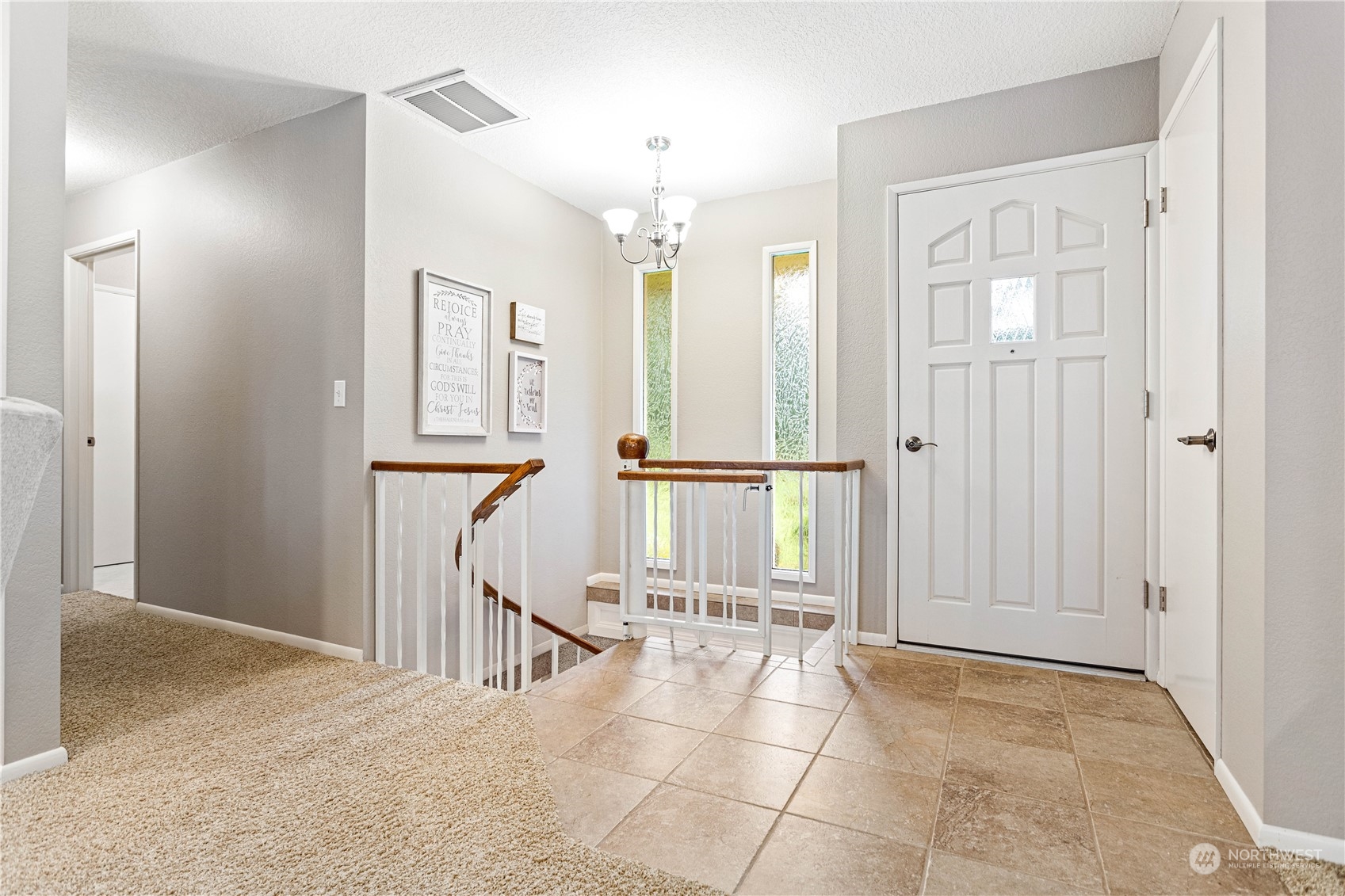 8669 Berthusen Road Lynden, WA 98264 - Photo 4 of 39 a view of a livingroom with furniture and windows