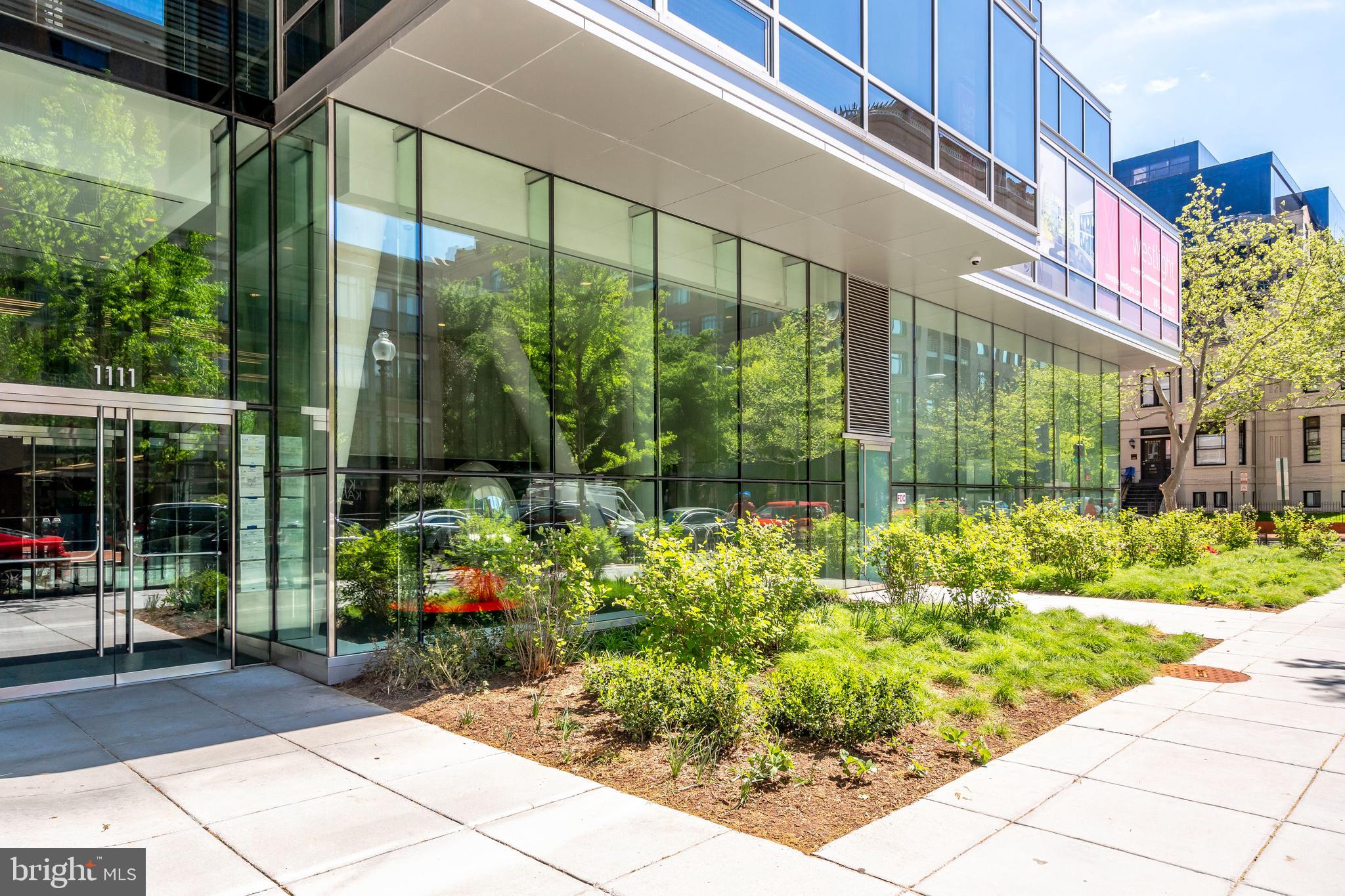 a front view of a building with garden