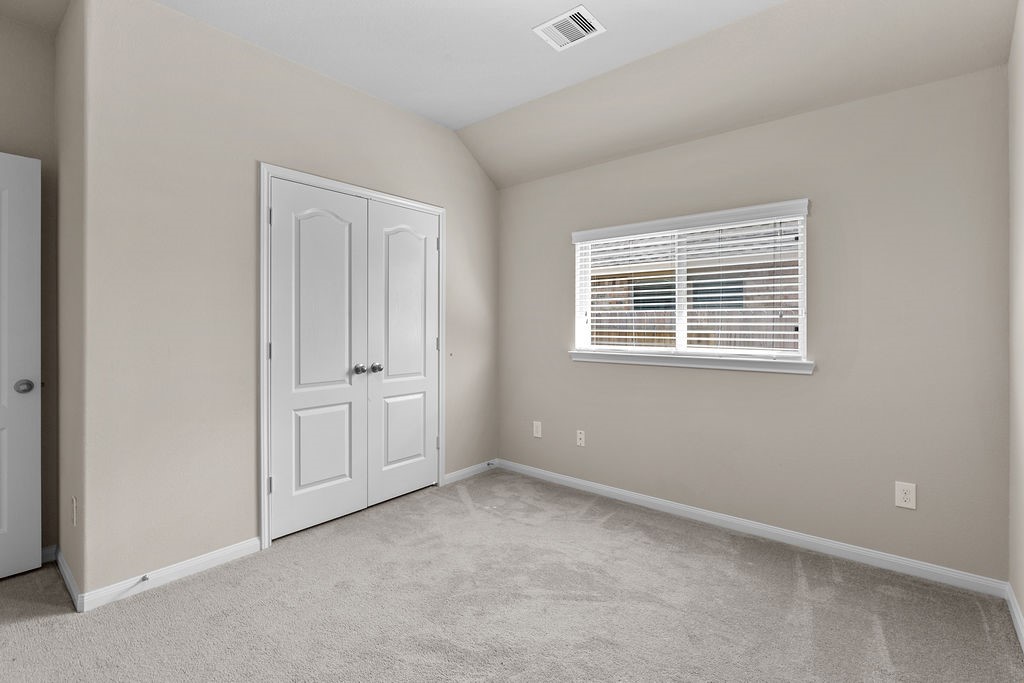 2666 Cedar Path Lane Conroe, TX 77385 - Photo 18 of 22 a view of an empty room with a window