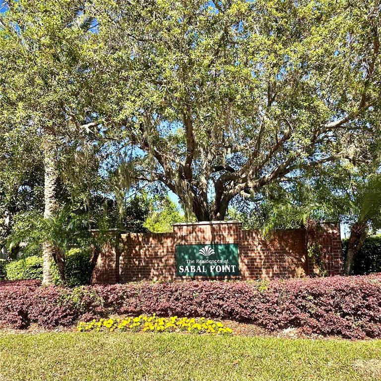 413 Summit Ridge Place, Unit 115 Longwood, FL 32779 - Photo 24 of 44 a view of a yard with plants