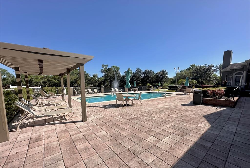 413 Summit Ridge Place, Unit 115 Longwood, FL 32779 - Photo 29 of 44 a view of a terrace with chairs