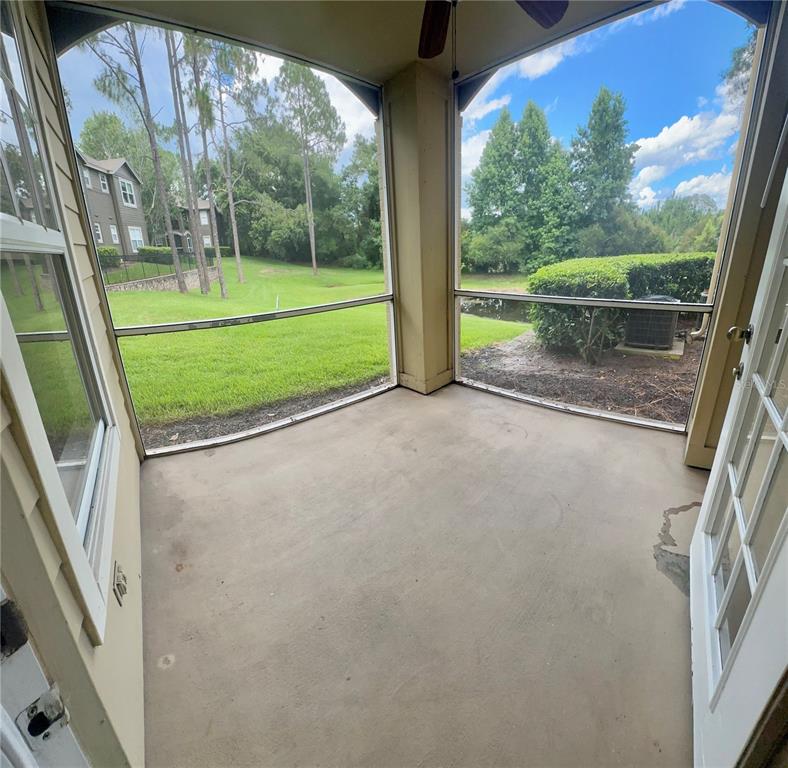 413 Summit Ridge Place, Unit 115 Longwood, FL 32779 - Photo 10 of 44 a view of a porch with garden