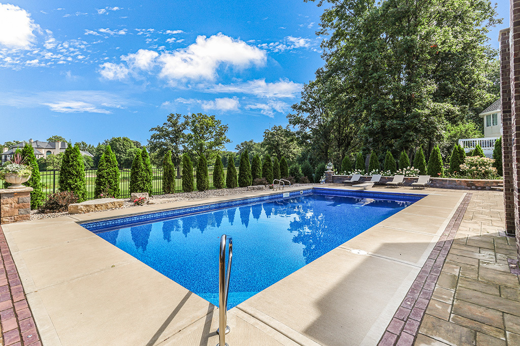 14151 131st Street Lemont, IL 60439 - Photo 12 of 62 a view of swimming pool with outdoor seating and plants