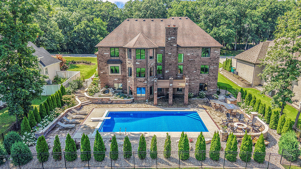 14151 131st Street Lemont, IL 60439 - Photo 2 of 62 a view of house with swimming pool and outdoor seating
