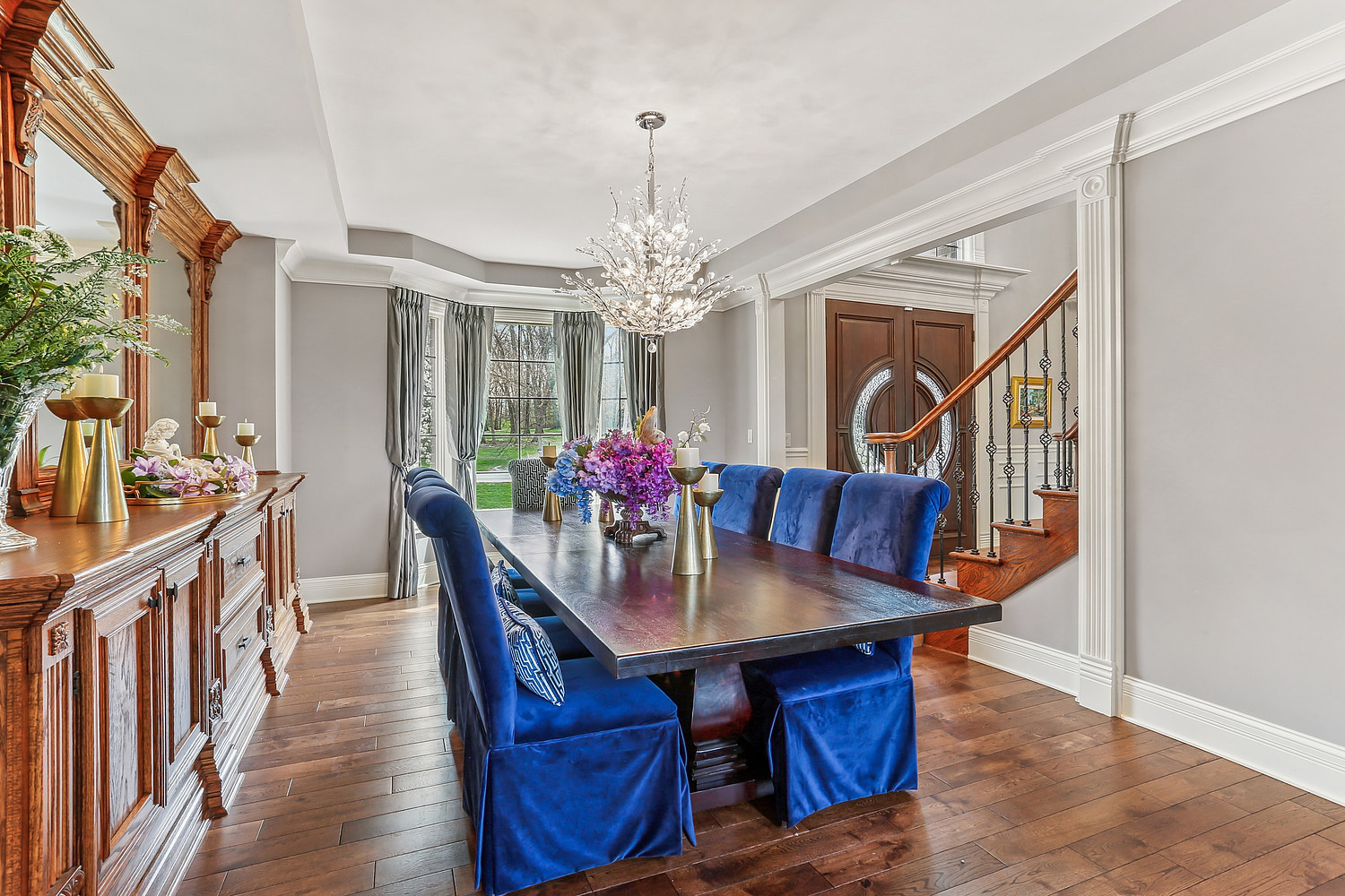14151 131st Street Lemont, IL 60439 - Photo 24 of 62 a view of a dining room with furniture window and wooden floor