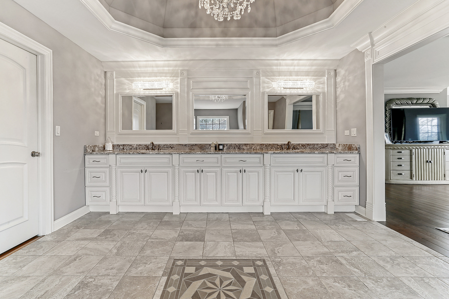 14151 131st Street Lemont, IL 60439 - Photo 49 of 62 a spacious bathroom with a granite countertop sink a mirror and bathtub