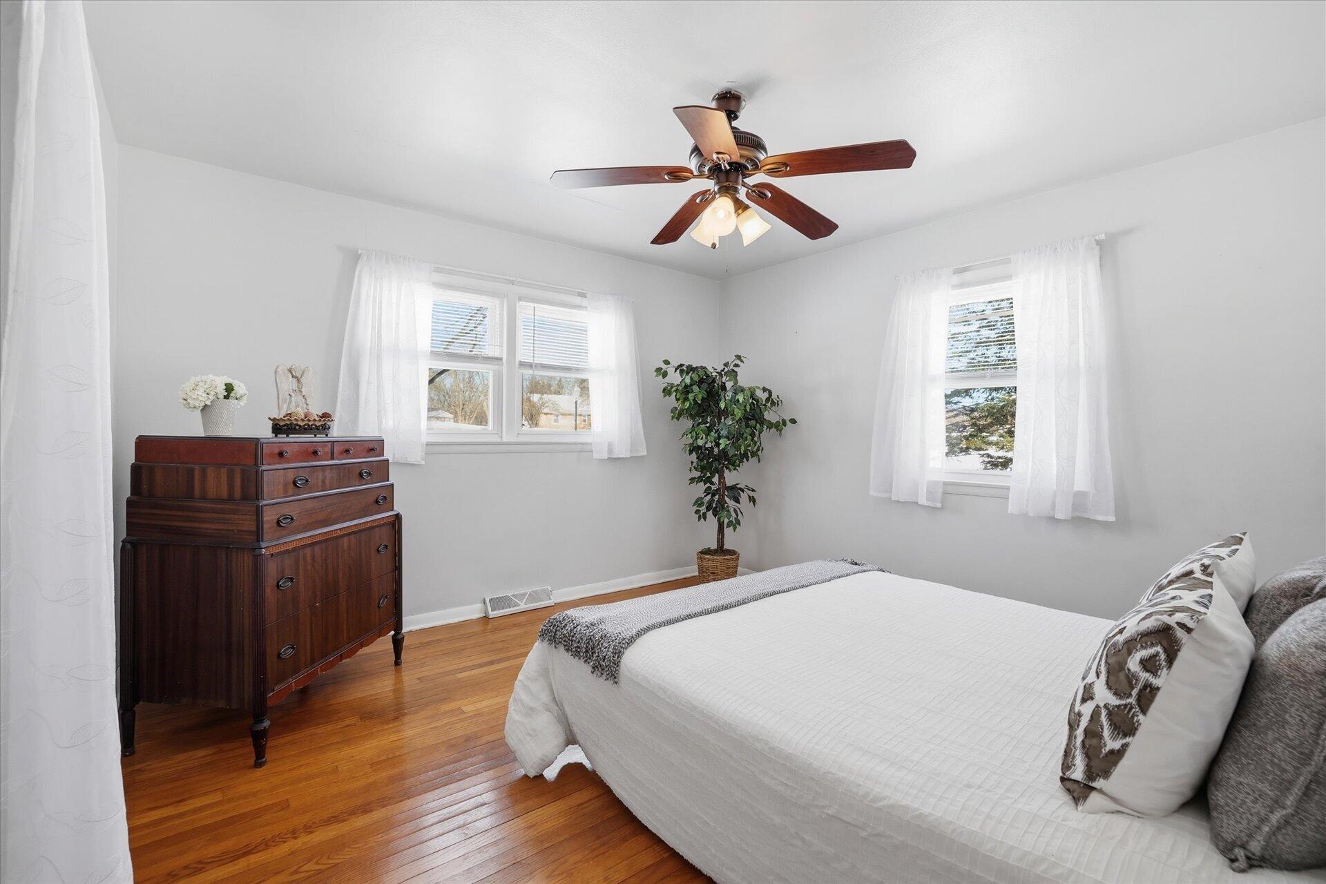 2330 South Sunny Slope Road New Berlin, WI 53151 - Photo 19 of 28 Master Bedroom w/ Hardwood Floors