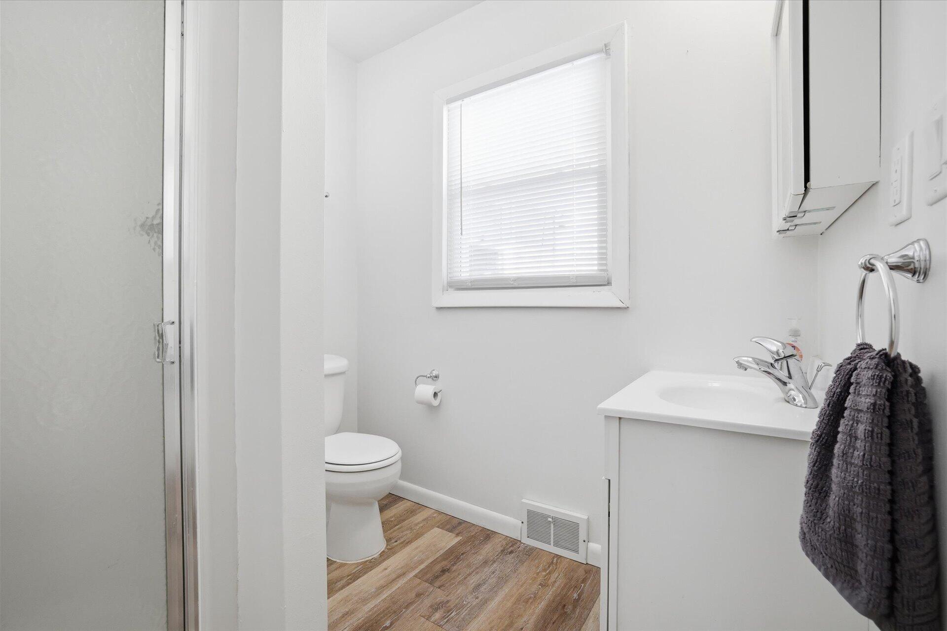 2330 South Sunny Slope Road New Berlin, WI 53151 - Photo 23 of 28 UPDATED 2nd Full BA w/SS & LVP Floor