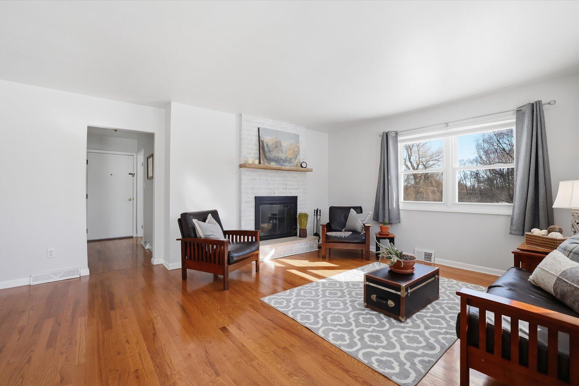 2330 South Sunny Slope Road New Berlin, WI 53151 - Photo 3 of 28 Spacious Family Room with NFP & HWF's