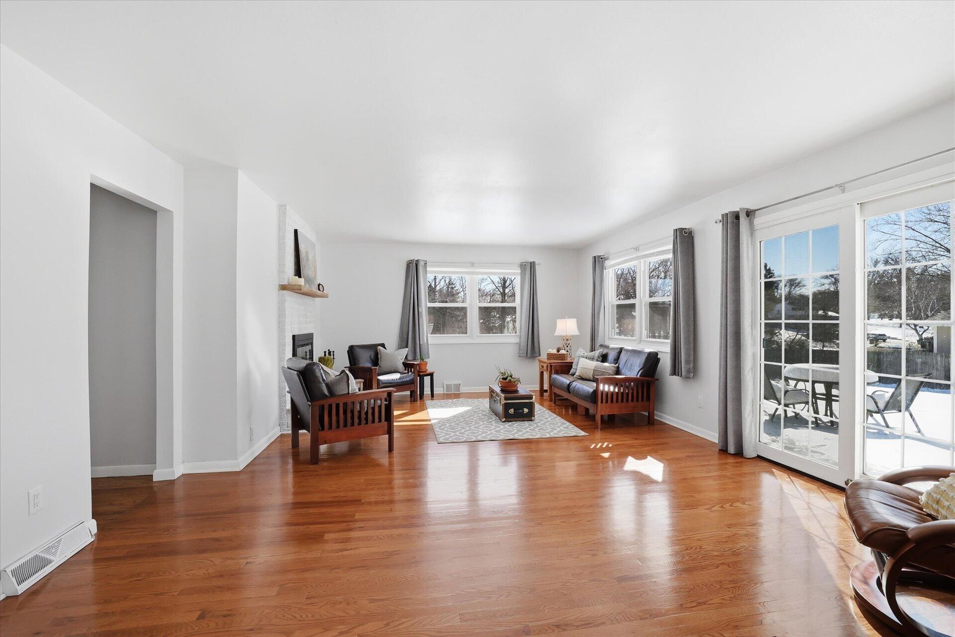 2330 South Sunny Slope Road New Berlin, WI 53151 - Photo 4 of 28 Bright Sunny Family room opens to Patio