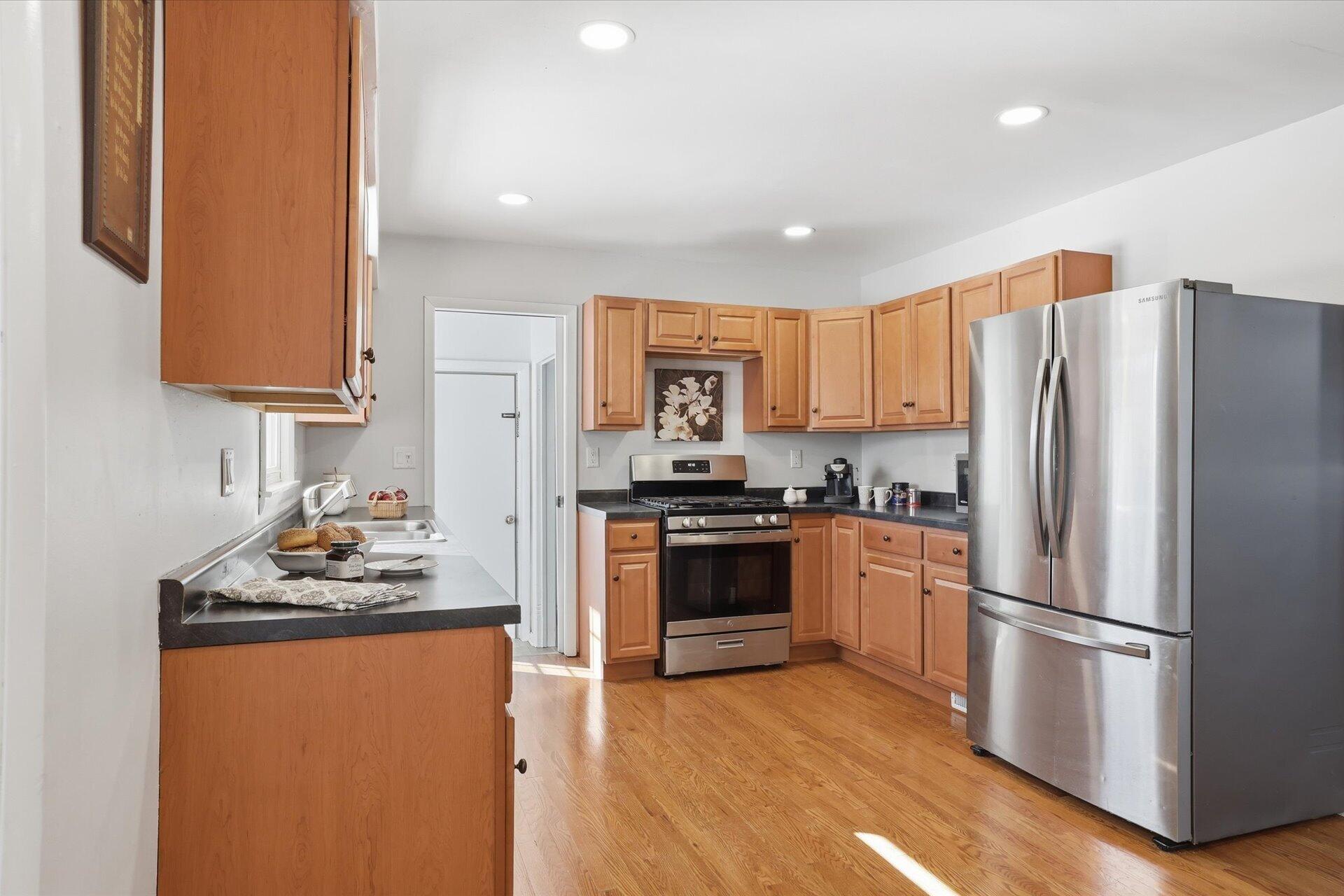 2330 South Sunny Slope Road New Berlin, WI 53151 - Photo 5 of 28 UPDATED Kitchen with Hardwood Floors