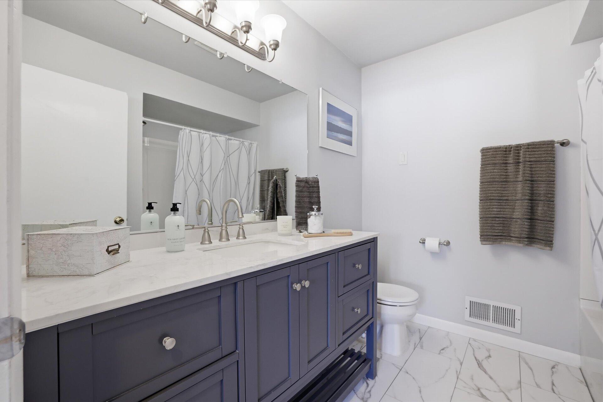 2330 South Sunny Slope Road New Berlin, WI 53151 - Photo 8 of 28 Beautiful UPDATED Main BA w/Tile Floor!