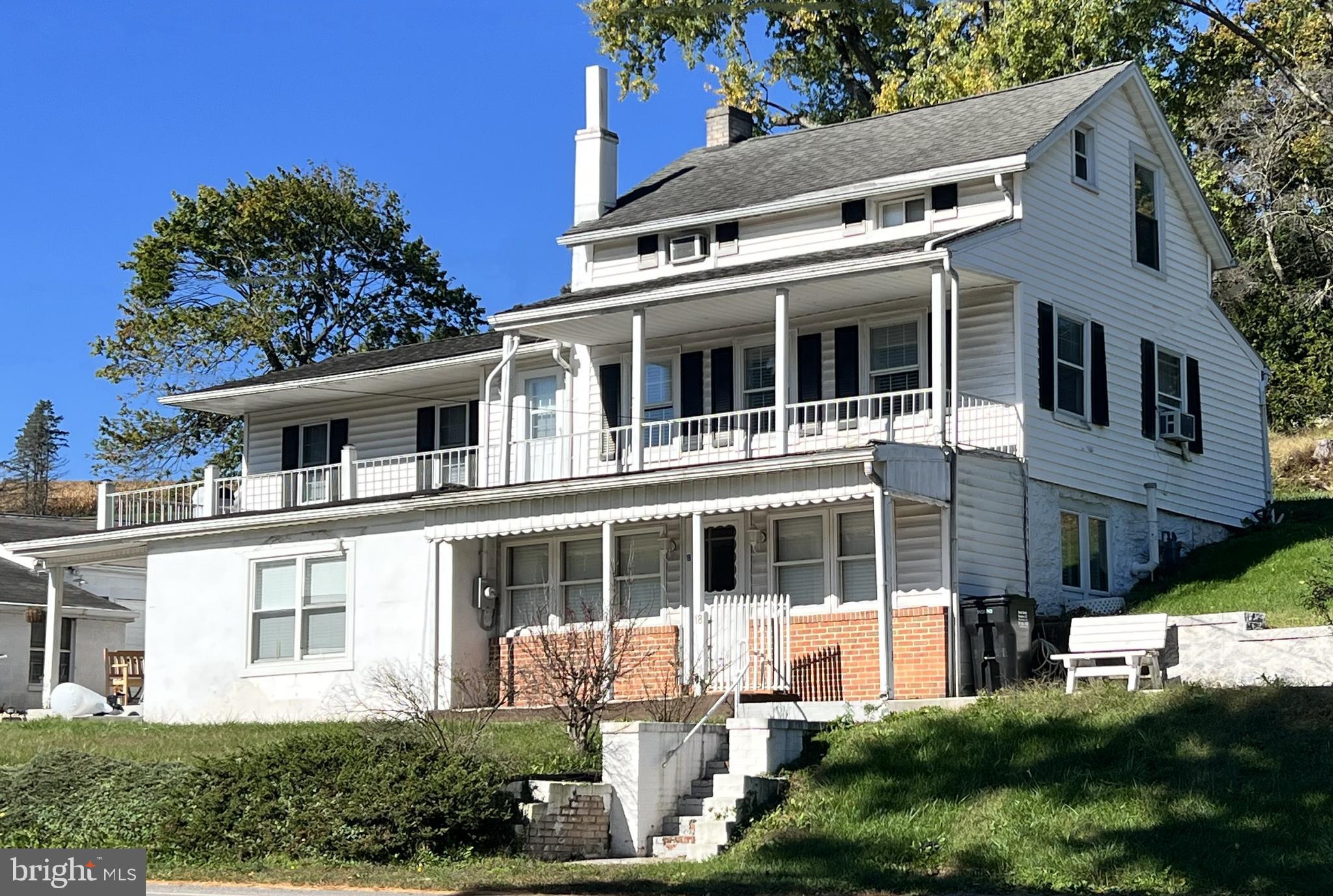 18 East Main Street, Unit B New Freedom, PA 17349 - Photo 1 of 11 a large white building with a large windows