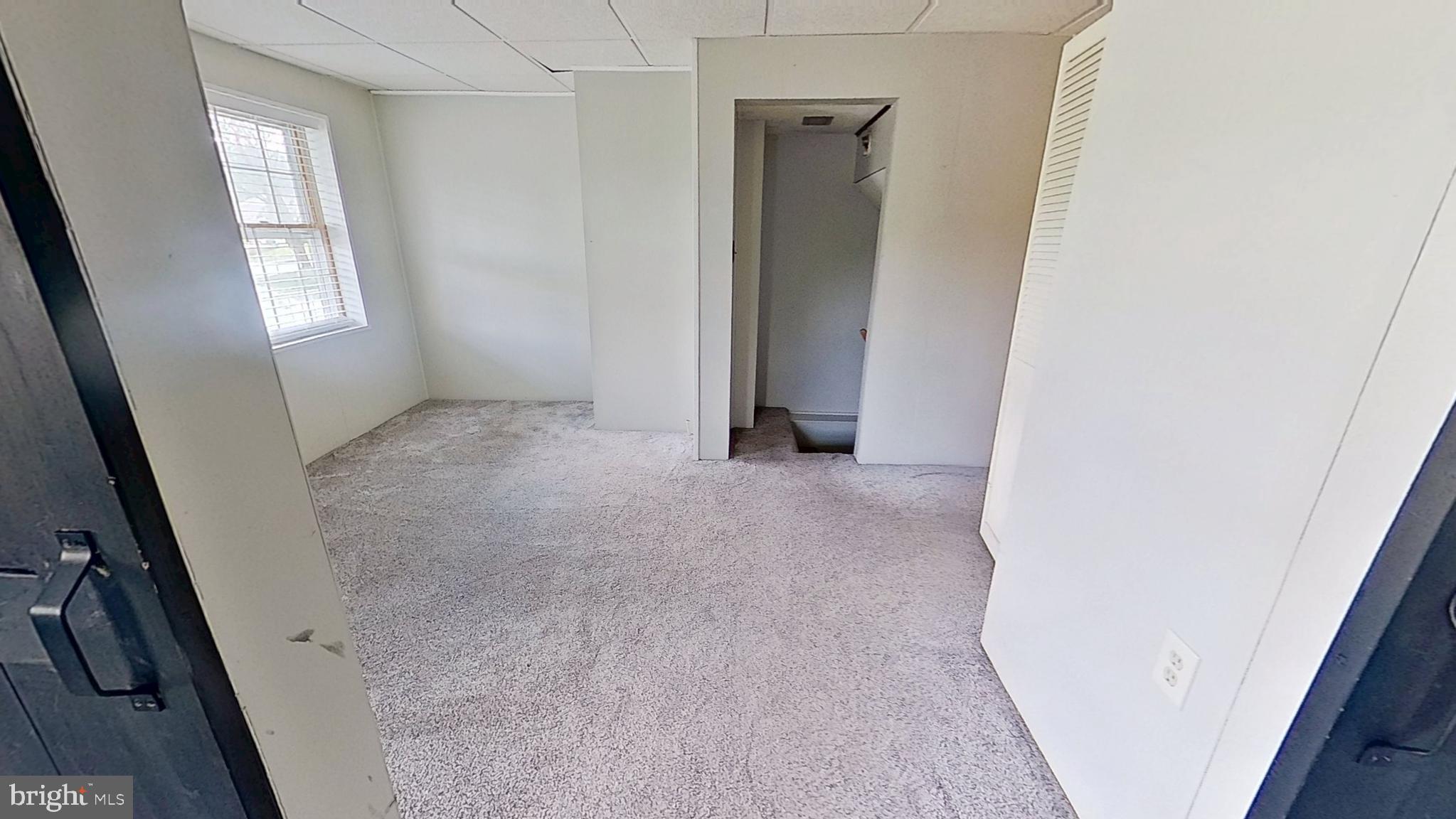 18 East Main Street, Unit B New Freedom, PA 17349 - Photo 5 of 11 an empty room with windows