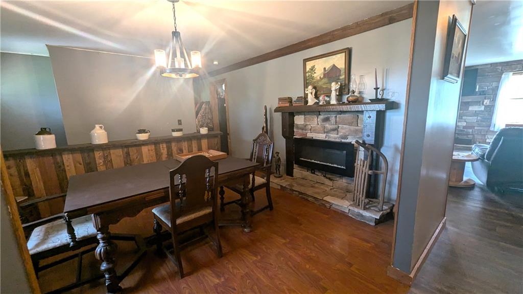 2509 Old Enon Unity Road Enon Valley, PA 16120 - Photo 6 of 19 a view of a livingroom with furniture and a fireplace
