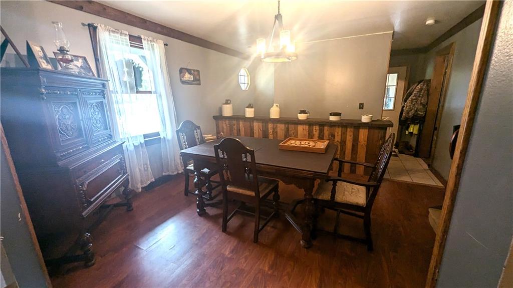 2509 Old Enon Unity Road Enon Valley, PA 16120 - Photo 7 of 19 a view of a dining room with furniture and wooden floor