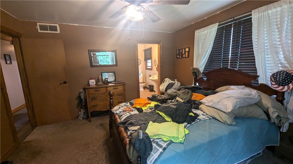 2509 Old Enon Unity Road Enon Valley, PA 16120 - Photo 10 of 19 a bedroom with furniture and a window