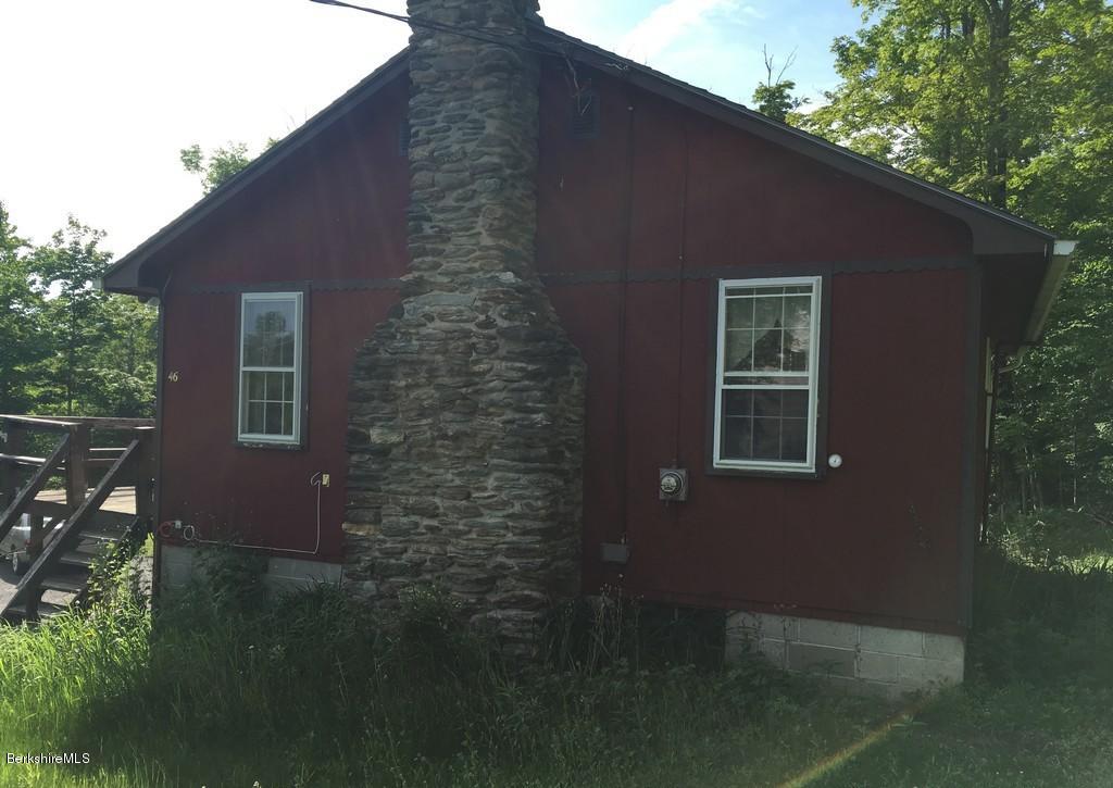 46 Hawley Road Savoy, MA 01256 - Photo 4 of 14 a brick building with a yard