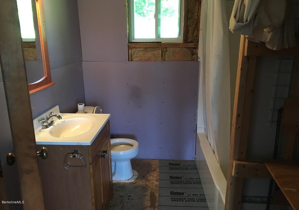 46 Hawley Road Savoy, MA 01256 - Photo 8 of 14 a bathroom with a sink toilet and mirror
