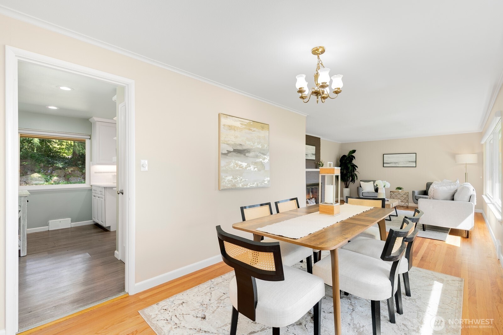 1429 Southwest 170th Street Normandy Park, WA 98166 - Photo 11 of 31 a view of a dining room with furniture and wooden floor
